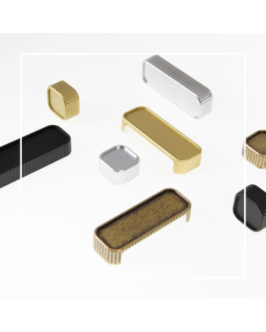 WEGA furniture handle designer handle arranged on a white surface