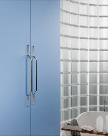 Polished chrome furniture handle GOLDEN design handle side view mounted on a wardrobe