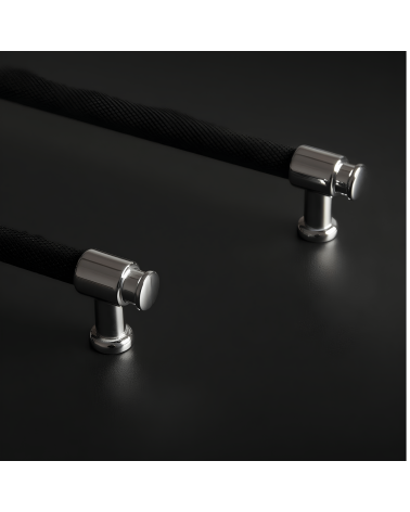 GALIUM black anodised/polished chrome furniture handle design handle placed on a dark background