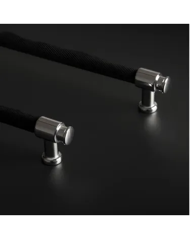 GALIUM black anodised/polished chrome furniture handle design handle placed on a dark background