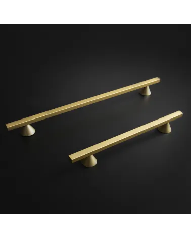 CERT design furniture handle in gold anode/matt gold on a dark background