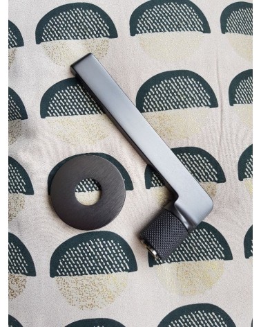 Mandelli Grint door handle designer handle colour 5 fitted on a background