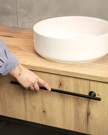 ROG designer furniture handle fitted on a wooden cabinet