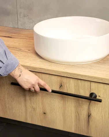 ROG designer furniture handle fitted on a wooden cabinet