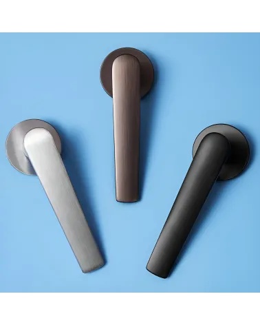 MILA design door handle arranged on a blue background