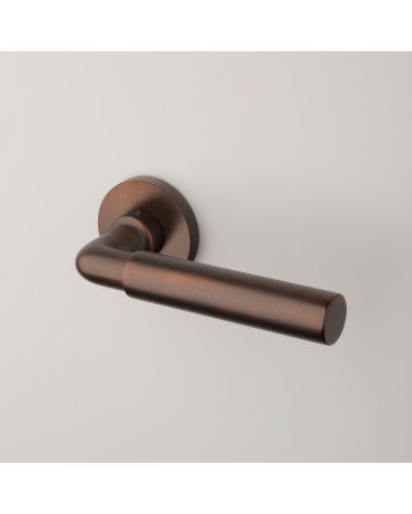 FICARIA door handle matt dark brown design handle on grey background