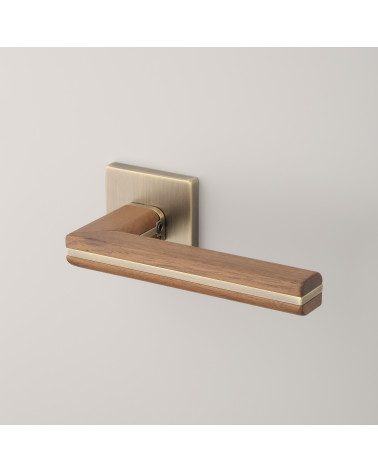 CYRILLA door handle in black walnut wood and antique brass