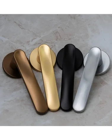 RITA door handle designer handle displayed on a grey surface