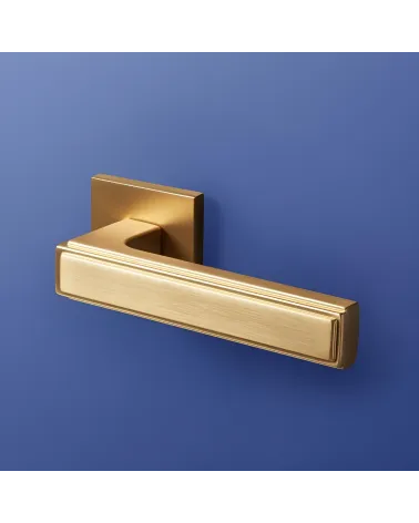 FRESSIA door handle designer handle on blue background