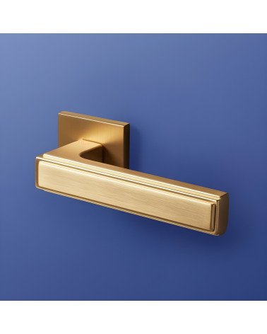 FRESSIA door handle designer handle on blue background