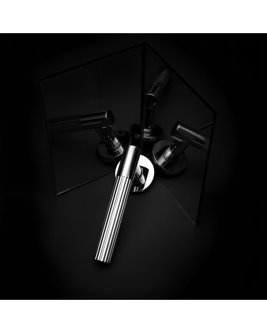 Polished chrome LIVIA door handle designer handle presented with mirror reflections