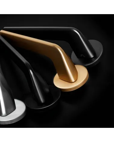 ANDREA door handle design handles aligned on dark background
