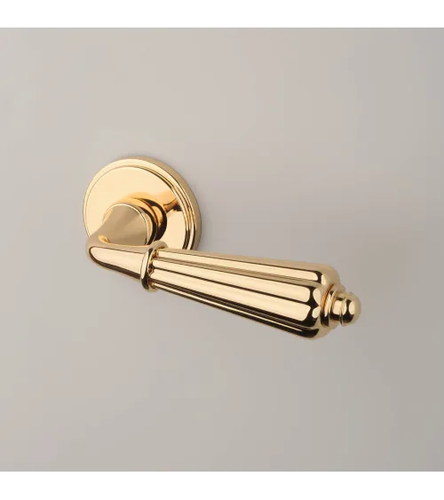LIMONA design door handle in polished gold