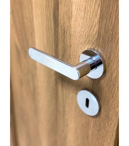 Polished chrome Line Vénus door handle designer handle