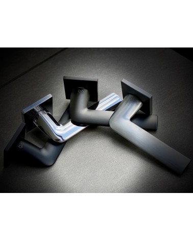 STINGER door handle designer handle in different colours on a dark background