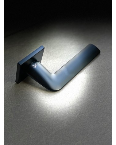 Black STINGER door handle designer handle on a lit background