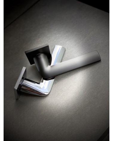 STINGER door handle designer handle with two colours placed on a dark background