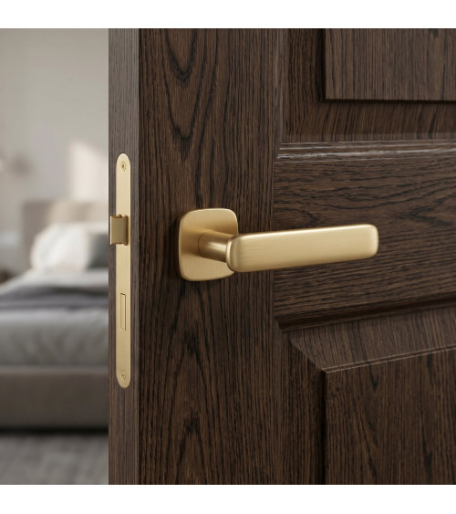 Satin gold FLOW door handle design handle