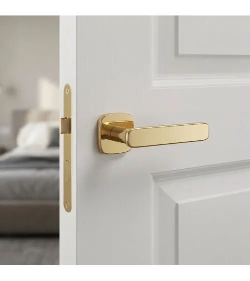 Polished gold FLOW door handle design handle