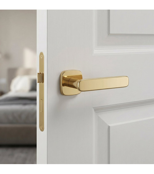 Polished gold FLOW door handle design handle