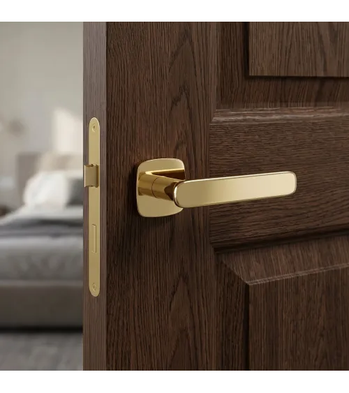 Polished gold FLOW door handle design handle