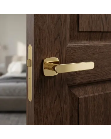 FLOW rounded square polished gold door handle