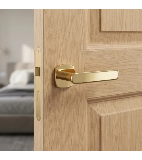 Polished gold FLOW door handle design handle