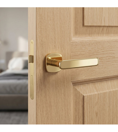 Polished gold FLOW door handle design handle