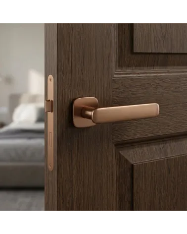 FLOW rounded square door handle in copper colour
