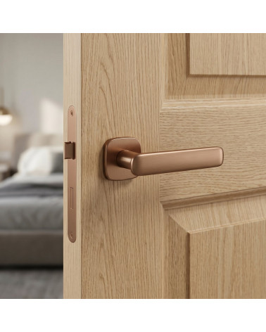 FLOW rounded square door handle in copper colour