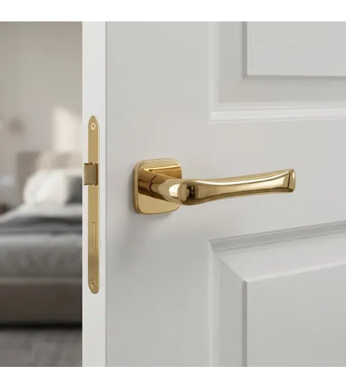 FOLD door handle in polished gold finish