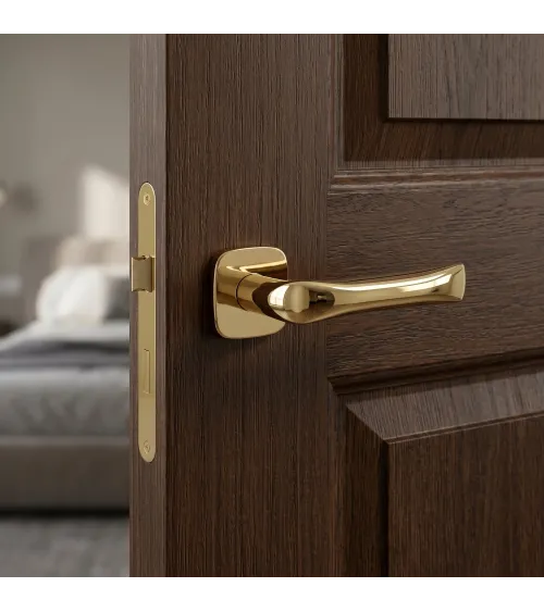 FOLD door handle in polished gold finish
