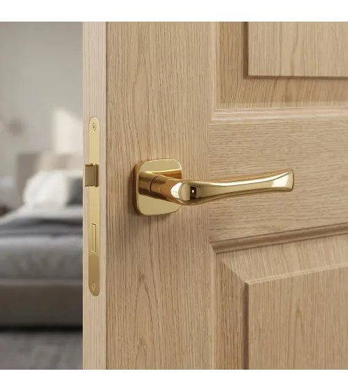 FOLD door handle in polished gold finish