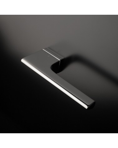 LUPINA polished chrome door handle design handle mounted on a door
