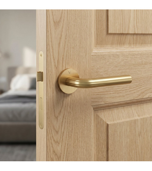 Satin brass Frella door handle designer handle