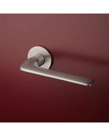 VIOLA brushed chrome door handle design handle mounted on a door