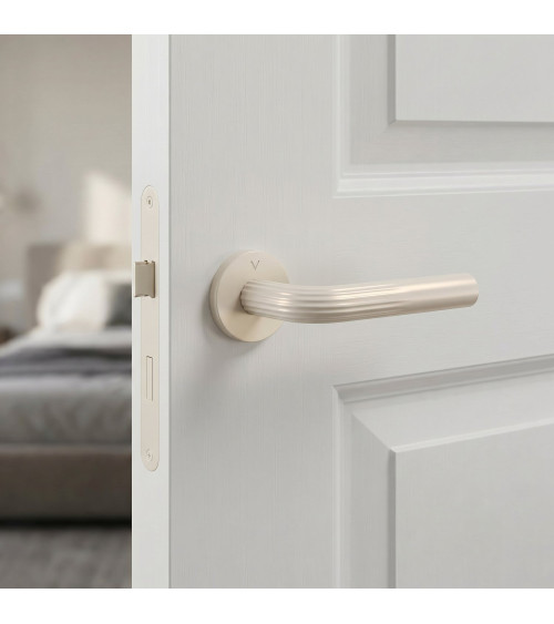 Minimalist zamak door handle FRELLA round designer handle