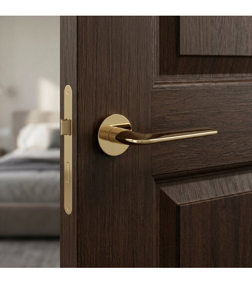 Polished gold Stinger door handle - designer handle