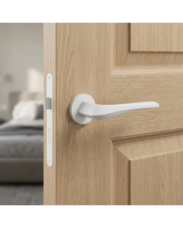 Matt white FLOW door handle on round backplate
