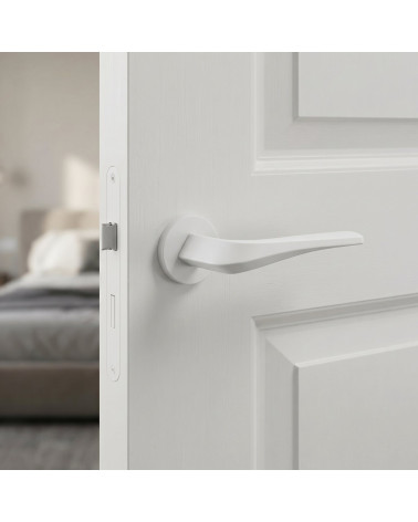 Matt white FLOW door handle on round backplate