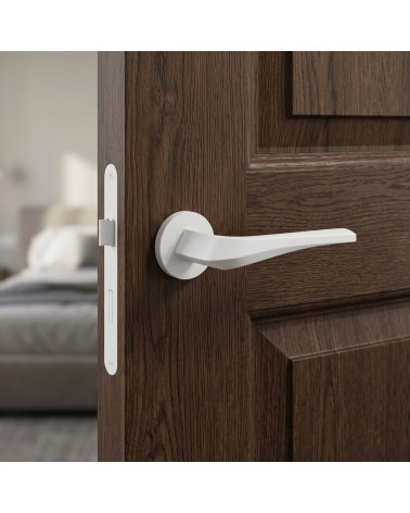 Matt white FLOW door handle on round backplate