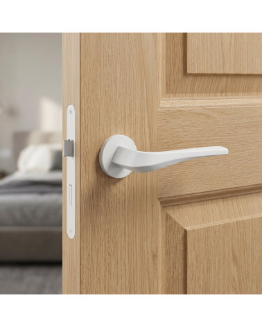 Matt white FLOW door handle on round backplate