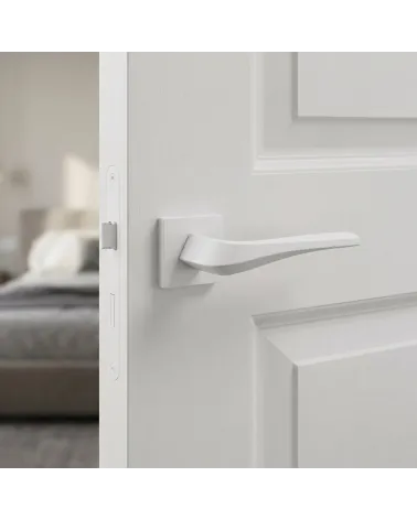 Matt white FLOW door handle on square backplate