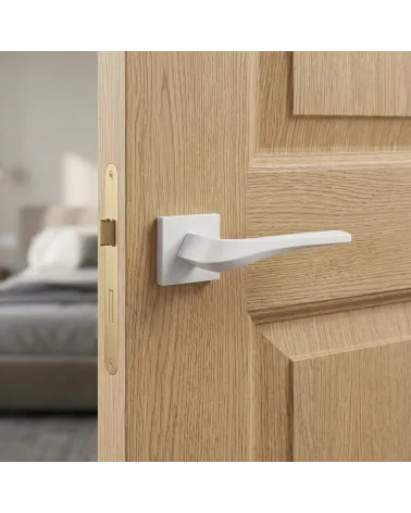 Matt white FLOW door handle on square backplate
