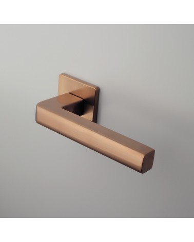 SALICE copper door handle designer hardware mounted on a door