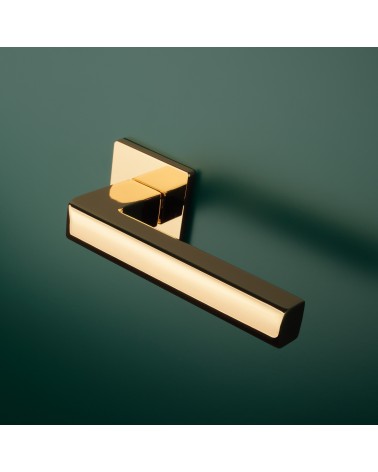 SALICE polished gold door handle design hardware mounted on a door