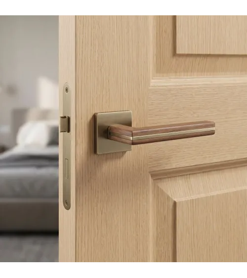 CYRILLA door handle in black walnut wood and antique brass