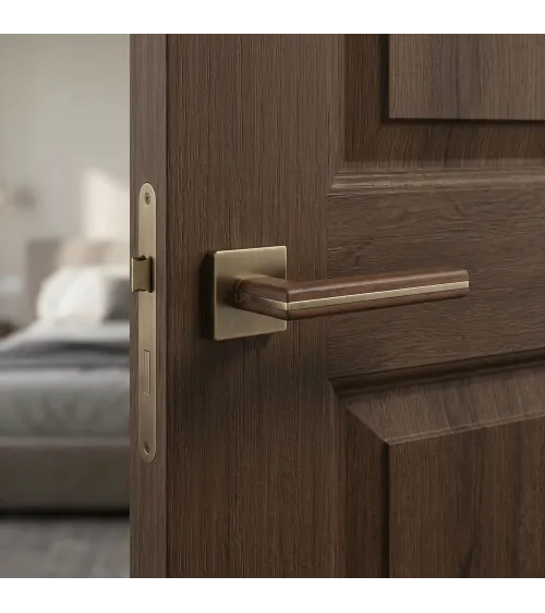 CYRILLA door handle in black walnut wood and antique brass