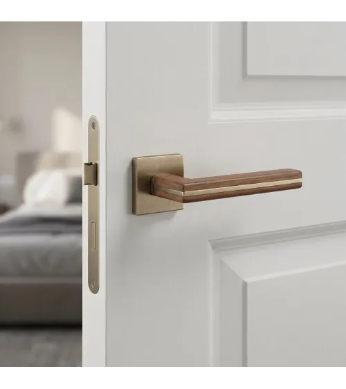 CYRILLA door handle in black walnut wood and antique brass