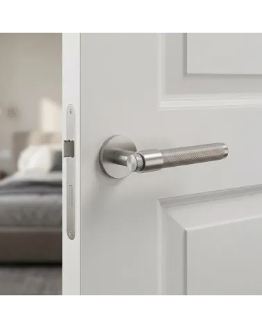 GOYA door handle on round rose